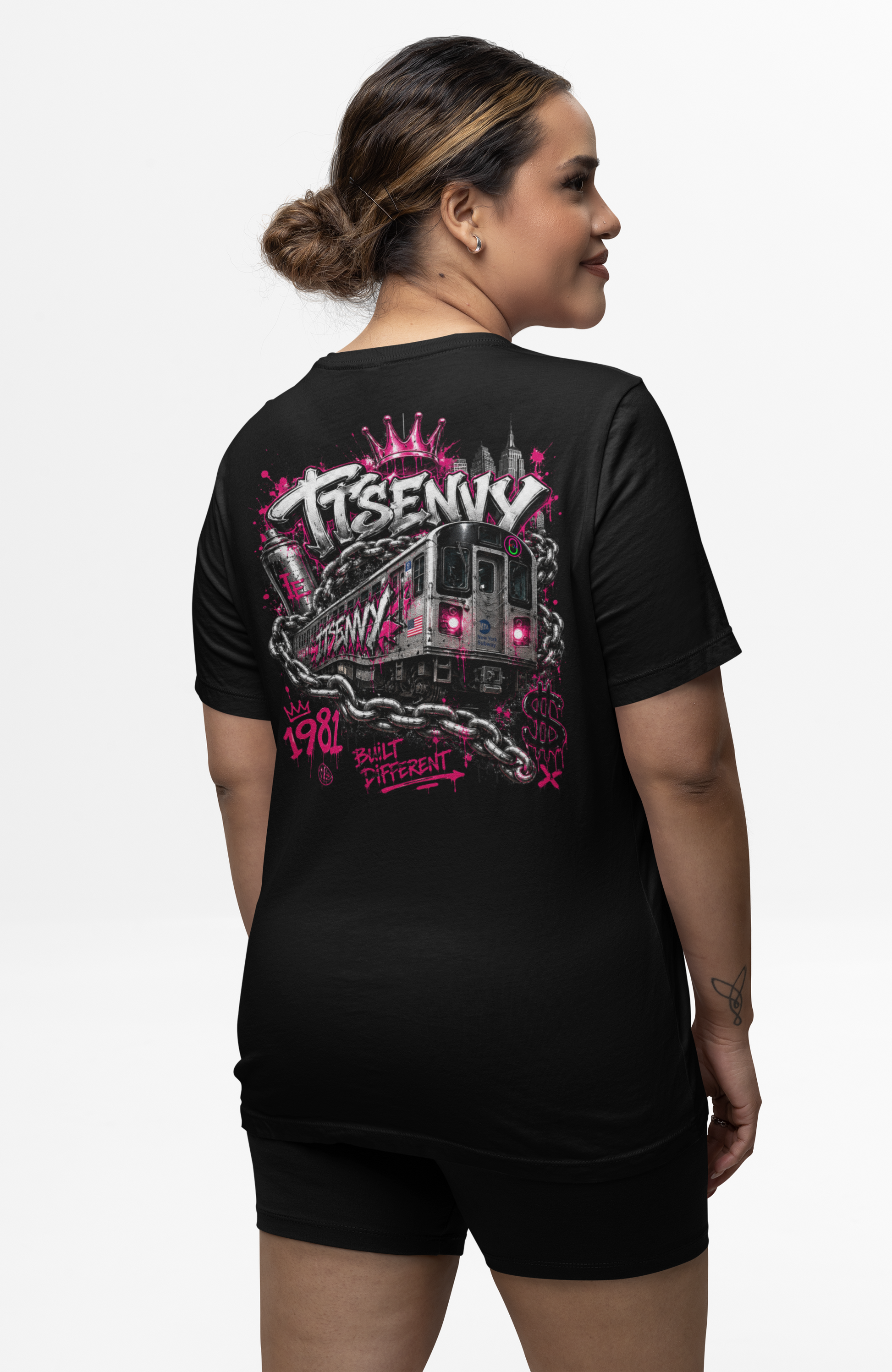 Woman wearing black Built Different graphic tee by It's Envy, back view