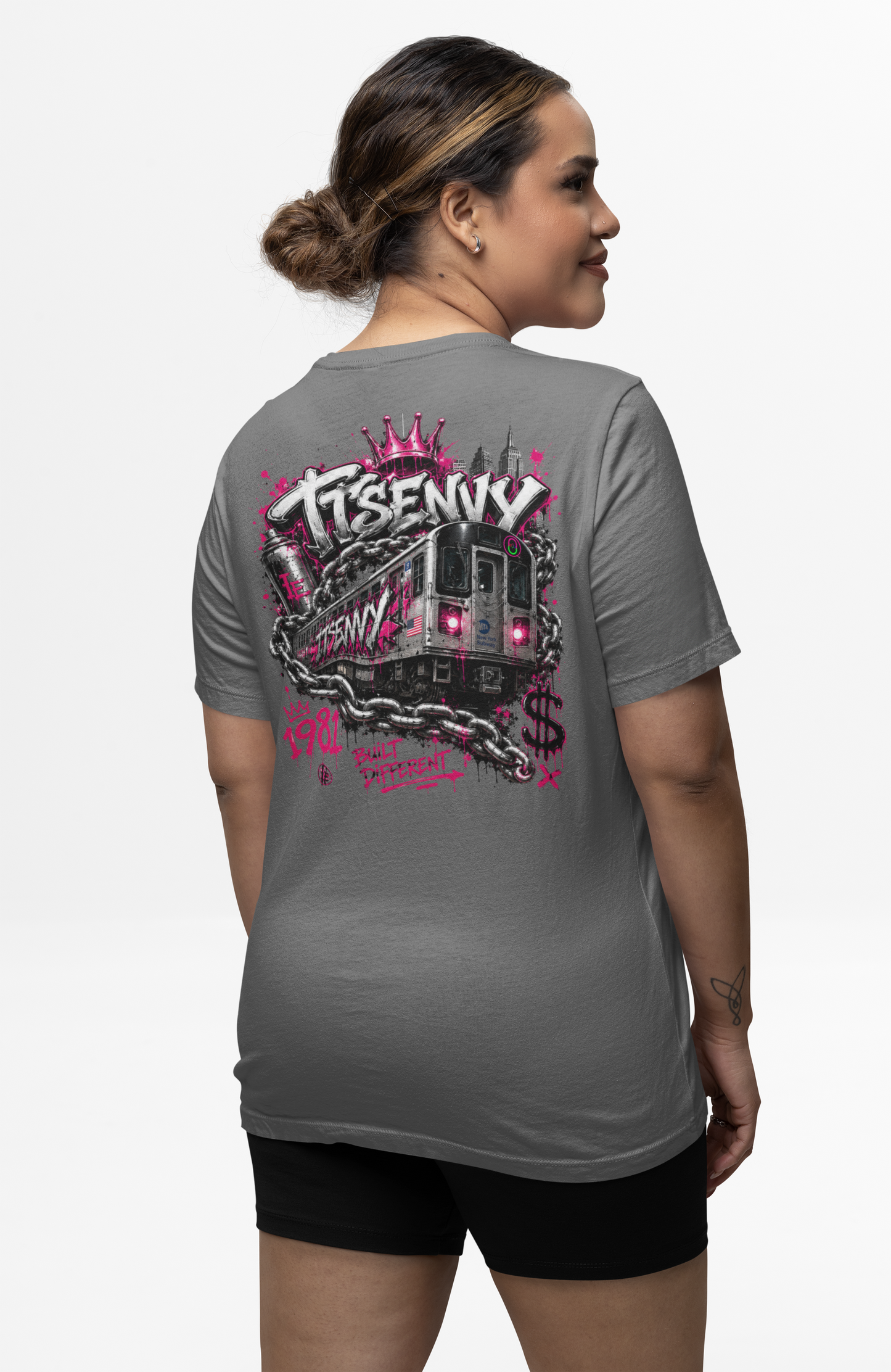 Woman wearing grey Built Different graphic tee by It's Envy, back view