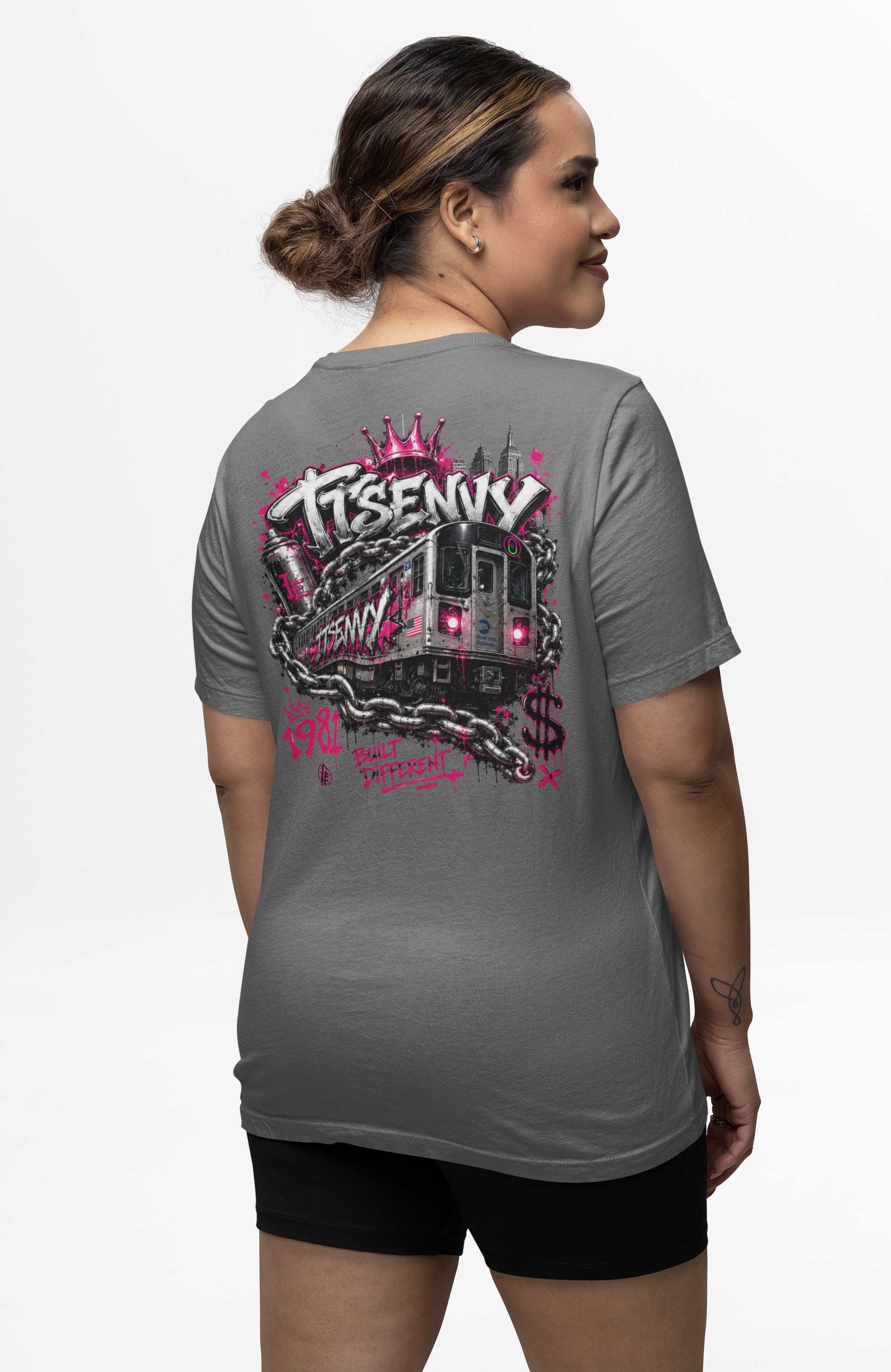Woman wearing grey Built Different graphic tee by It's Envy, back view